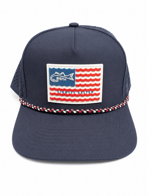 Navy blue cap with American flag patch and braided trim on a white background